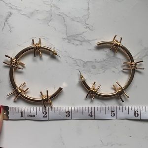 Gold colored barbed wire earrings